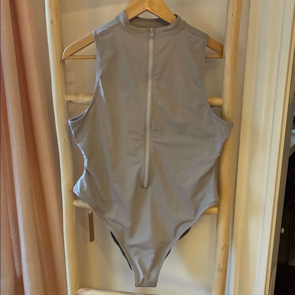 Skims recycled swim sleeveless one piece.